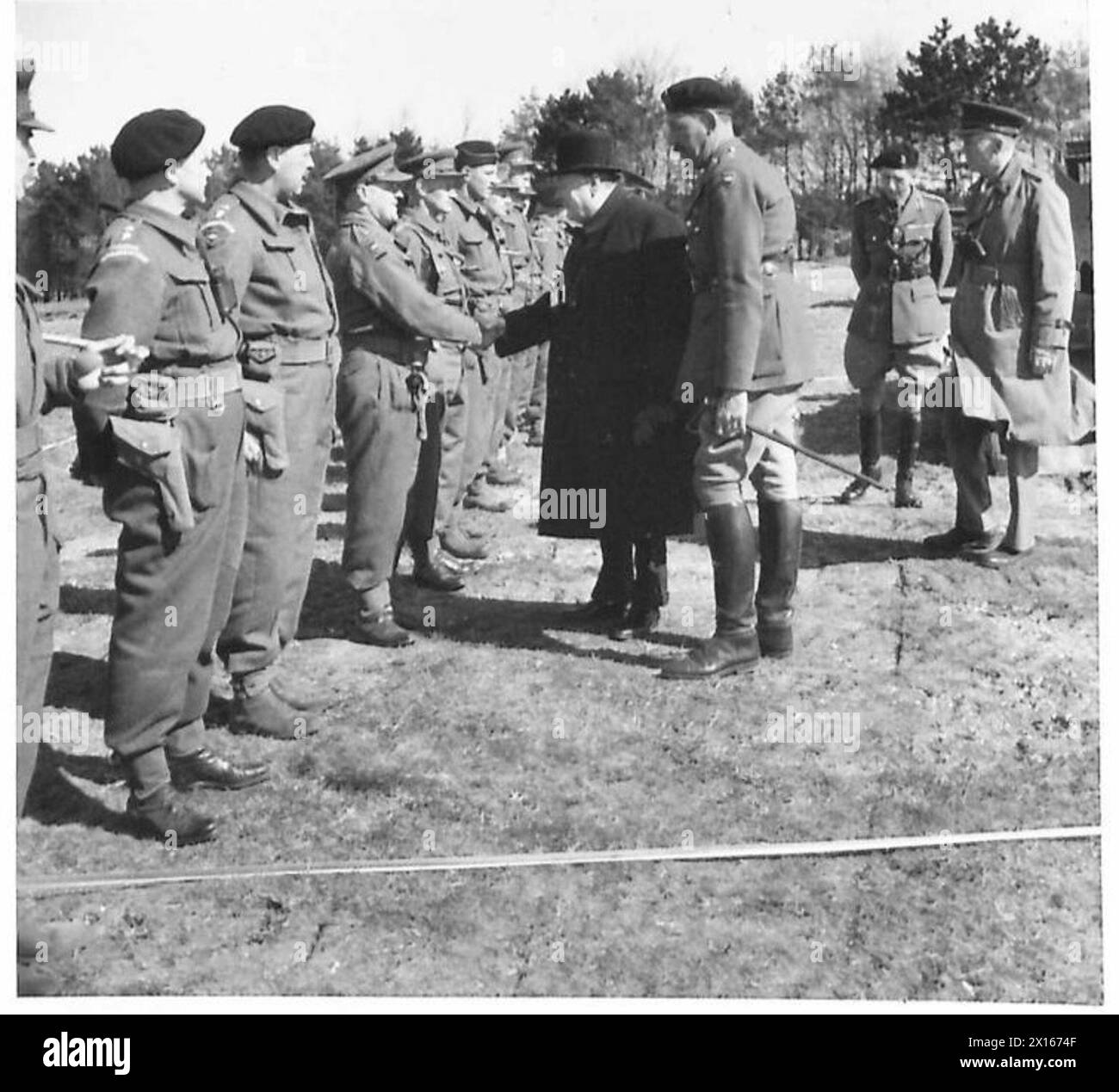 PRIME MINISTER AND GENERAL MARSHALL VISIT TROOPS - PM shaking hands ...