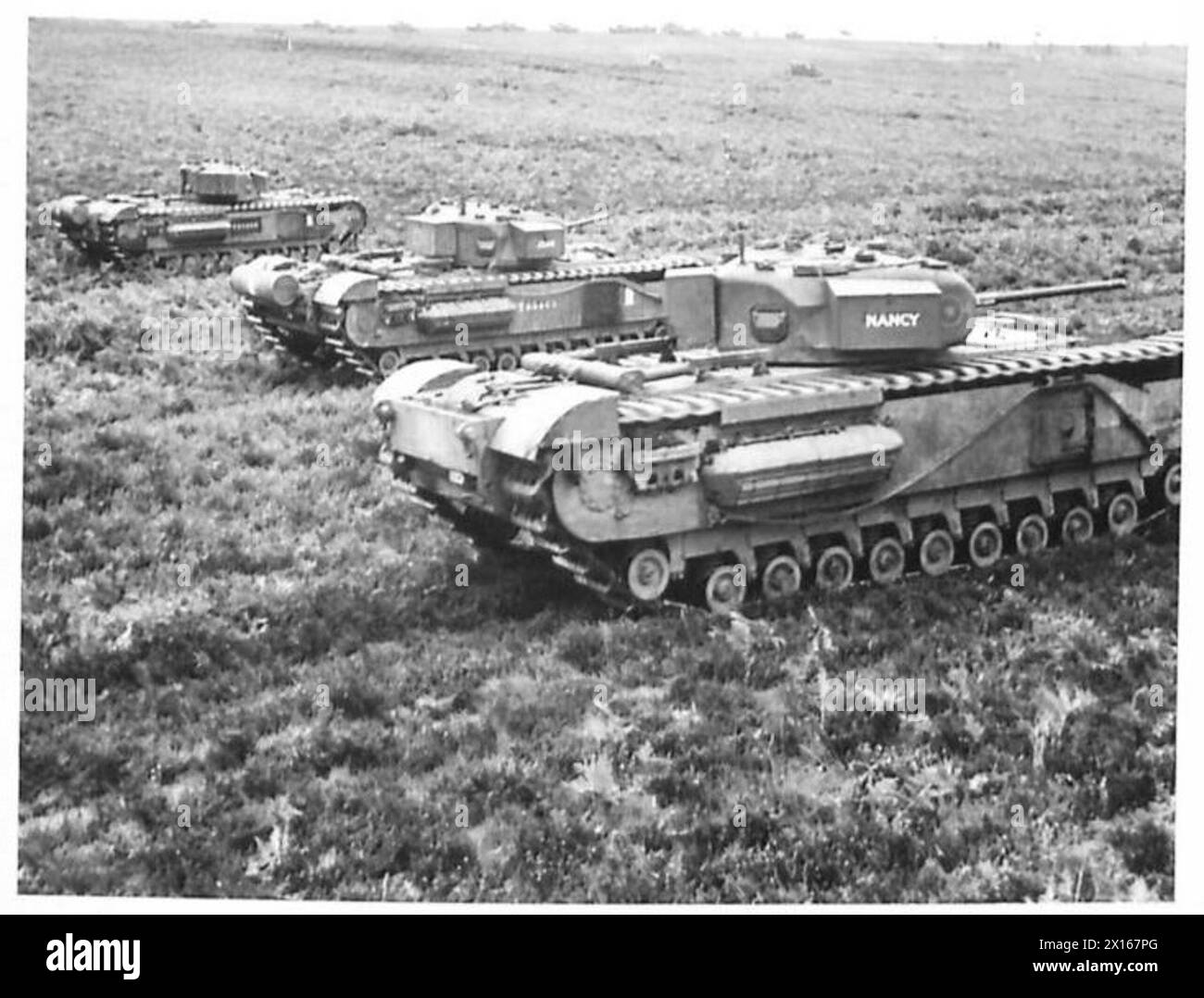 Three Churchill tanks demonstrated in formation by the Army Tank ...