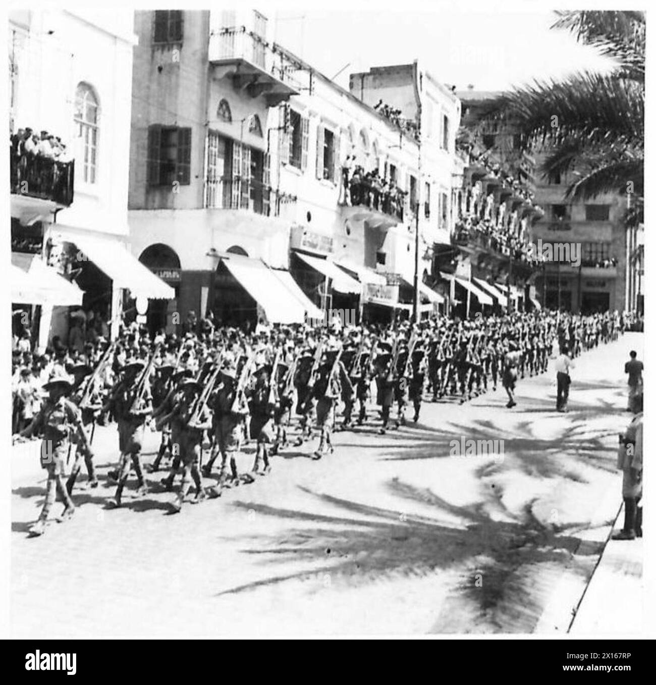 ENTRY OF THE BRITISH GENERAL AND TROOPS INTO BEIRUT - Australian troops marching to the martial strains of their band through the city British Army Stock Photo