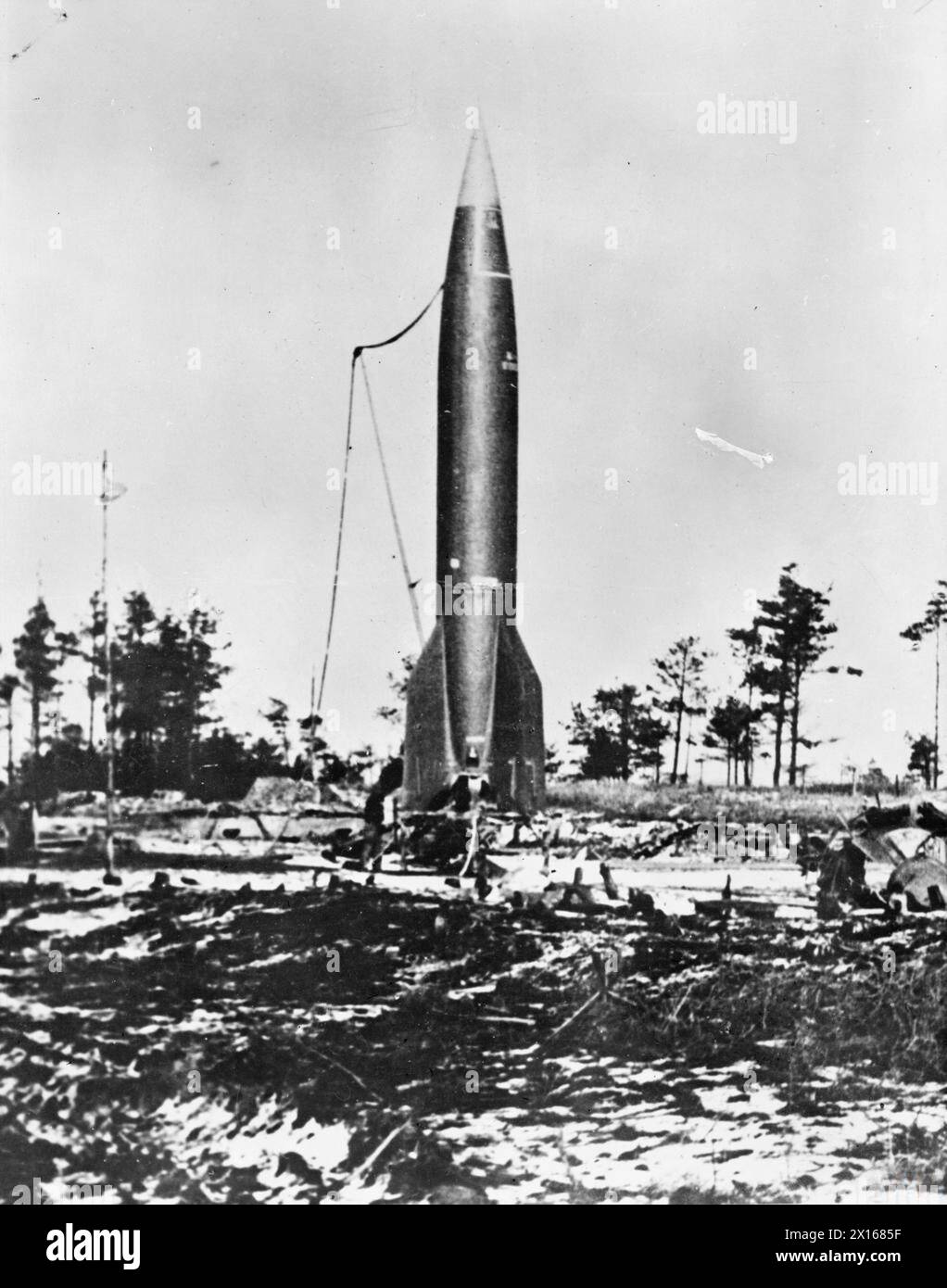 A German V-2 rocket is positioned on a launching platform for launch ...