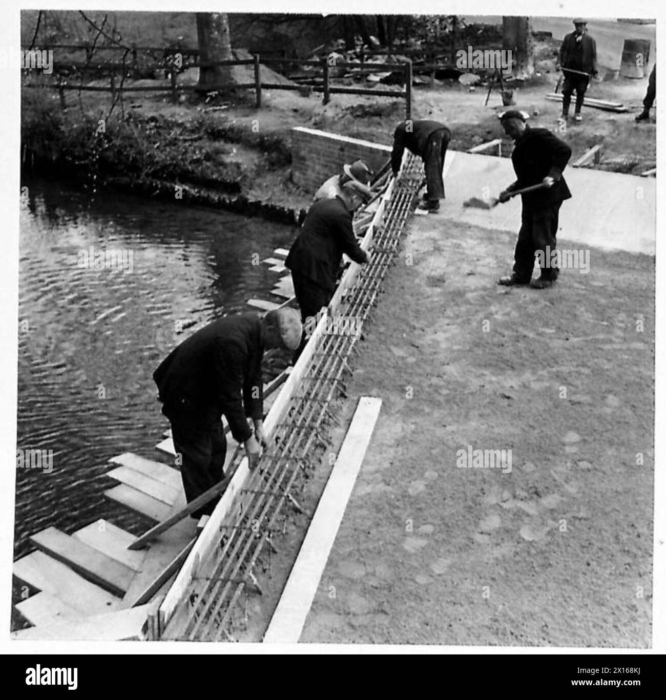 ROAD WIDENING - Photographs show the widening of a bridge on the ...