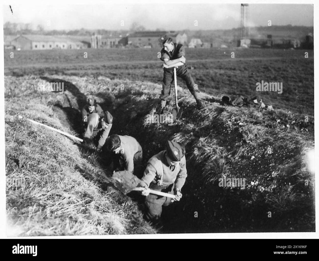 Soldiers from the Young Soldier's Battalion engaged in trench digging ...