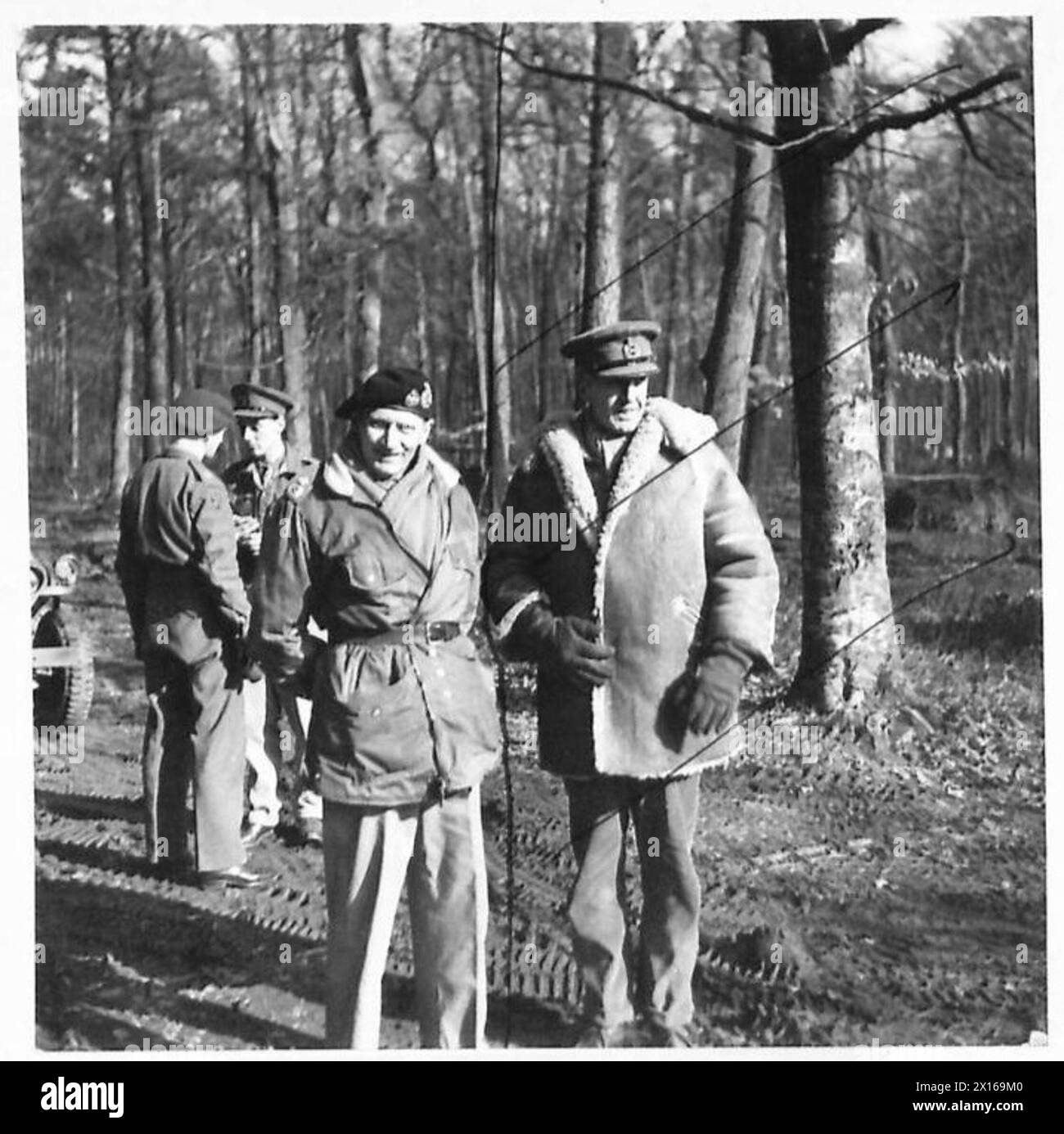 THE C-in-C WITH HIS FORWARD TROOPS - The C-in-C with Lt-Gen B.C. Horrocks, GOC 30 Corps who is wearing a captured German sheepskin coat British Army, 21st Army Group Stock Photo