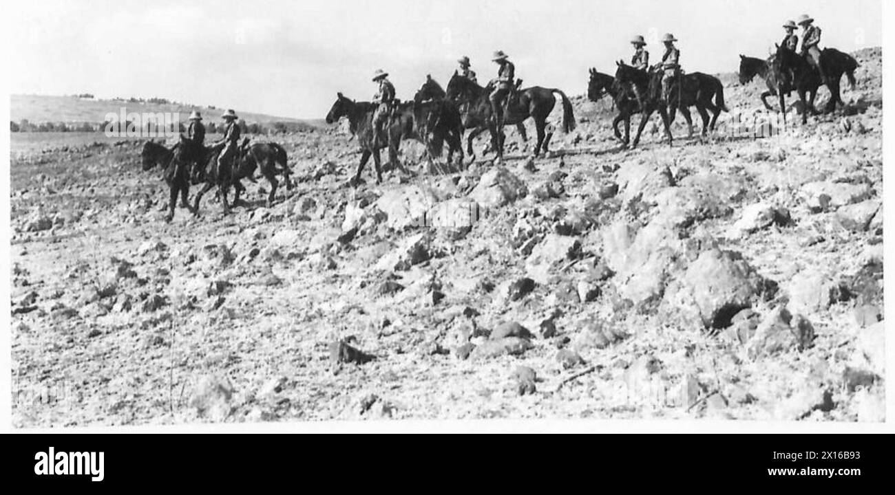 MOUNTED TROOPS IN PALESTINE - Out for morning exercise over rough
