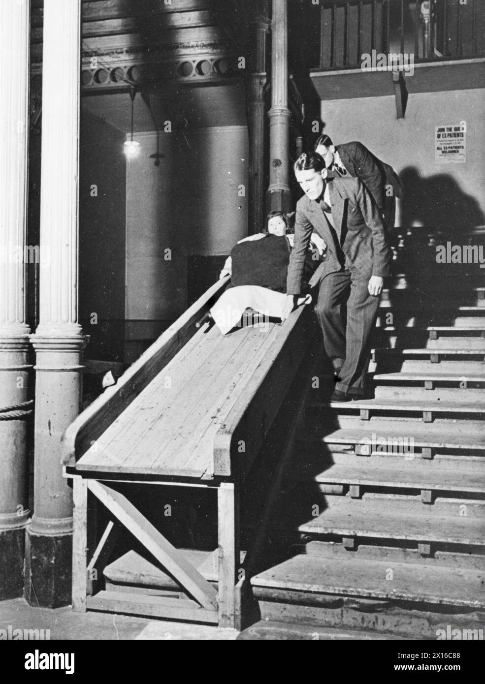 At Guy's Hospital in London, 1941, porters use a temporary ramp to ...