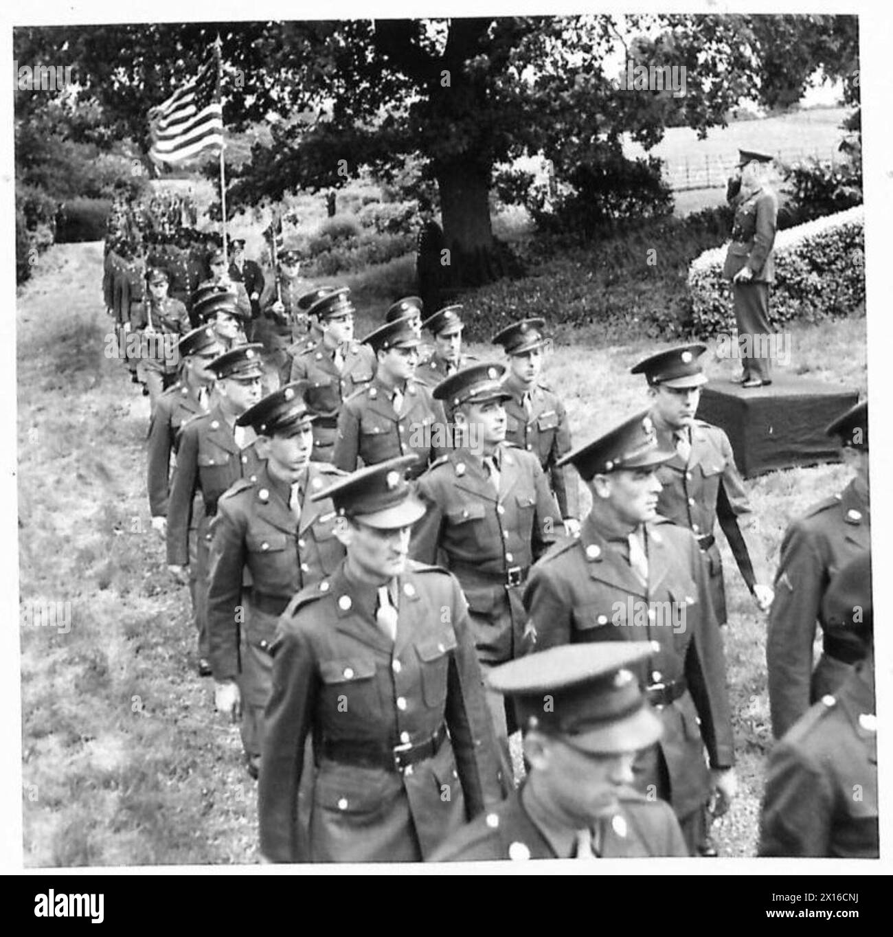 'SALUTE THE SOLDIER' WEEK AT BUSHEY HEATH - A company of Americans pass the saluting base. General Sir F.A. Pile is seen taking the salute British Army Stock Photo
