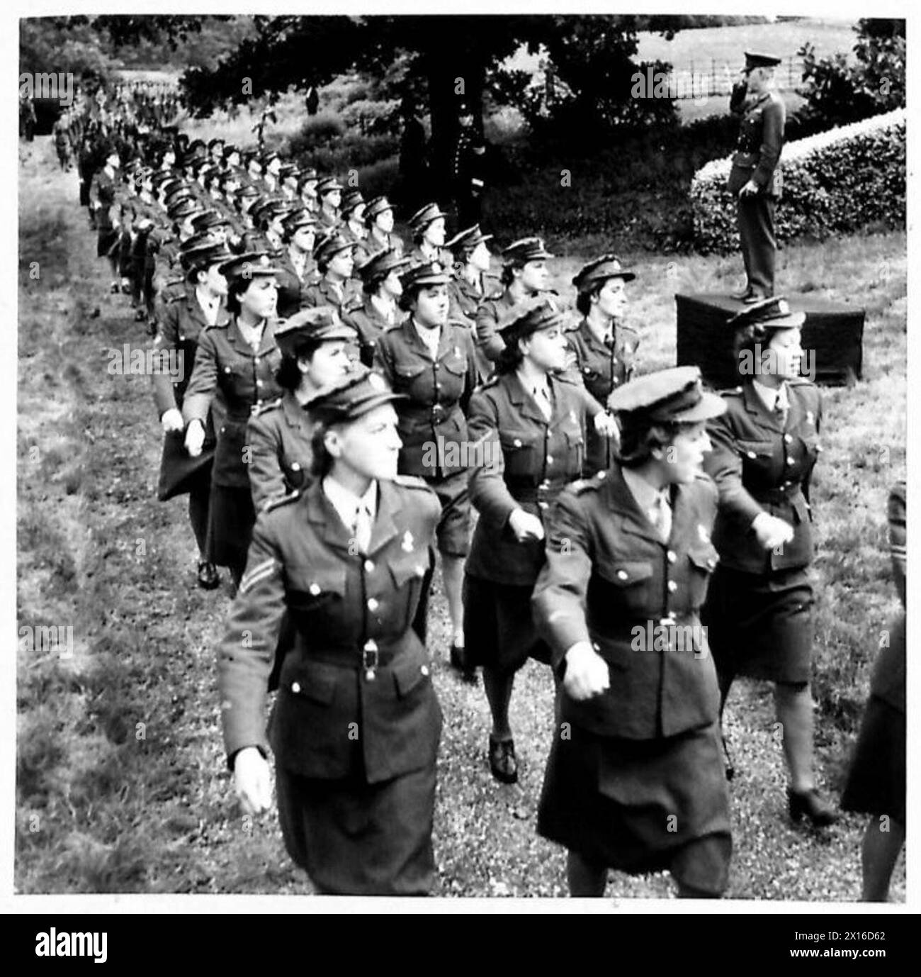 'SALUTE THE SOLDIER' WEEK AT BUSHEY HEATH - Members of the A.T.S. march past the GOC-in-C A.A.Command, General Sir F.A. Pile British Army Stock Photo