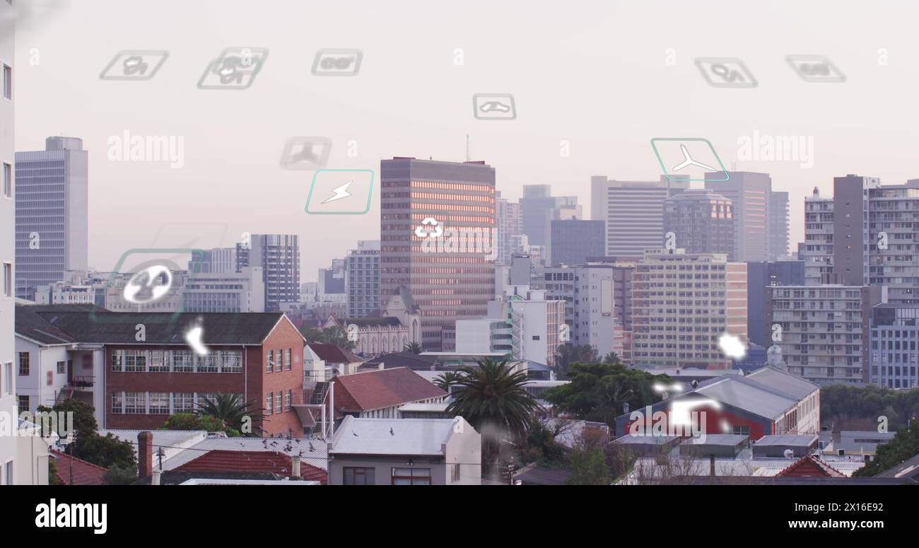 Image of eco icons and data processing over cityscape Stock Photo