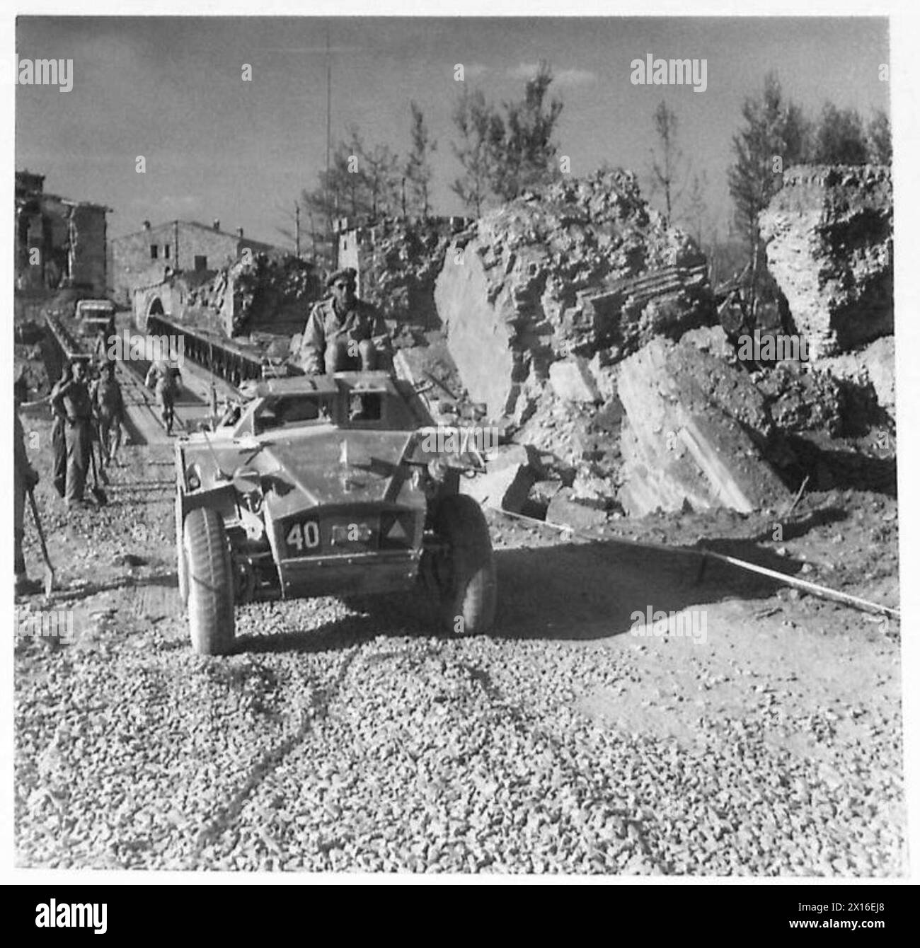 Major General C.F. Loewen of the Eighth Army returns to his scout car after visiting front line troops of the 1st Division. Stock Photo