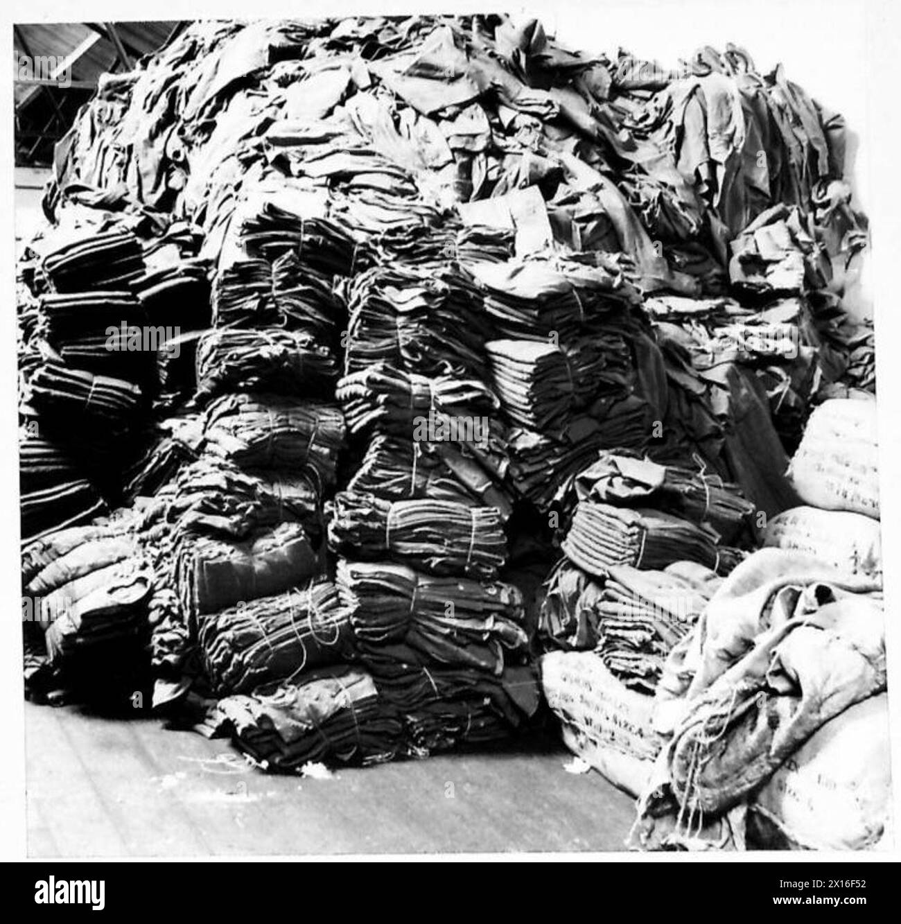 ARMY CLOTHING DEPOT - A stack of shirts ready for despatch British Army Stock Photo