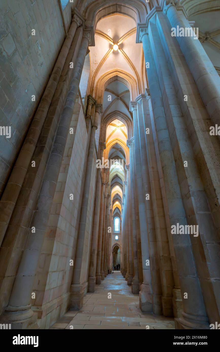 The side aisle of the church of the Alcobaça Monastery (Mosteiro de Alcobaça)  or Alcobasa Monastery  is a Catholic monastic complex located in the to Stock Photo
