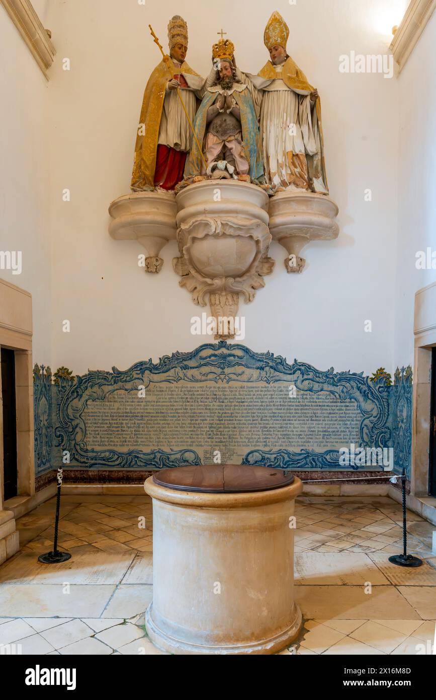 The sculpture depicts coronation of King Alfonso I, by Saint Bernard and Pope Alexander III. The Kings Hall (Sala dos Reis). The Alcobaça Monastery (M Stock Photo