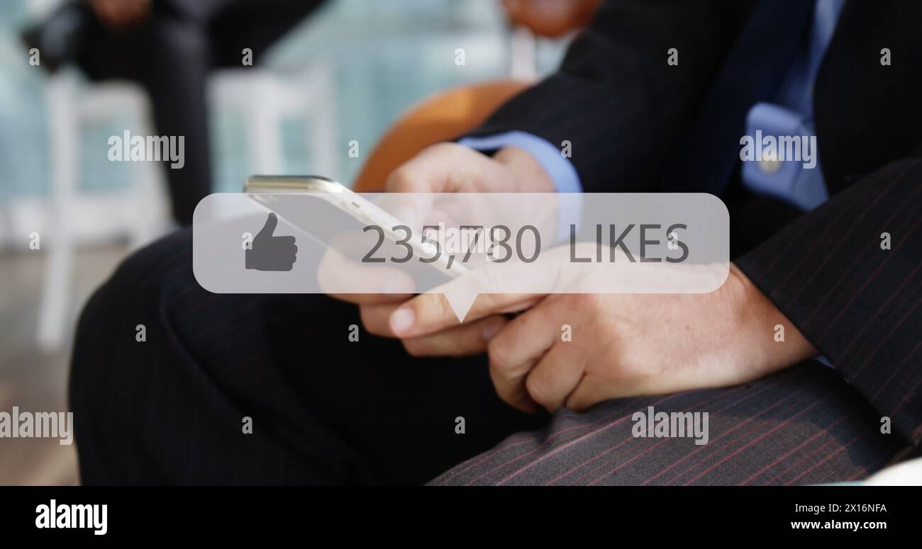 Image of media icon over hands using smartphone Stock Photo