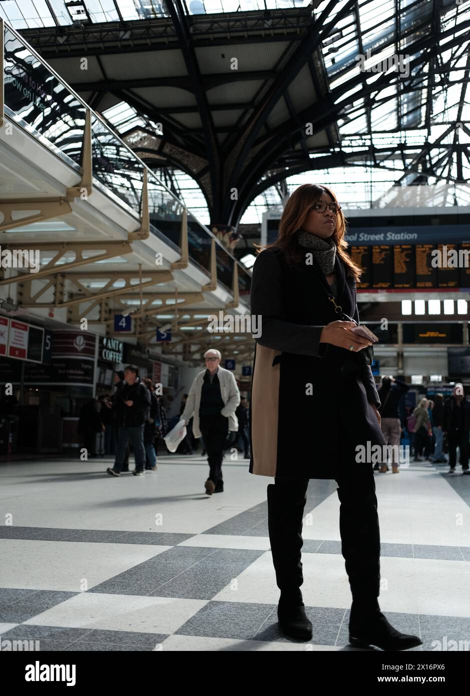 A woman in a station Stock Photo