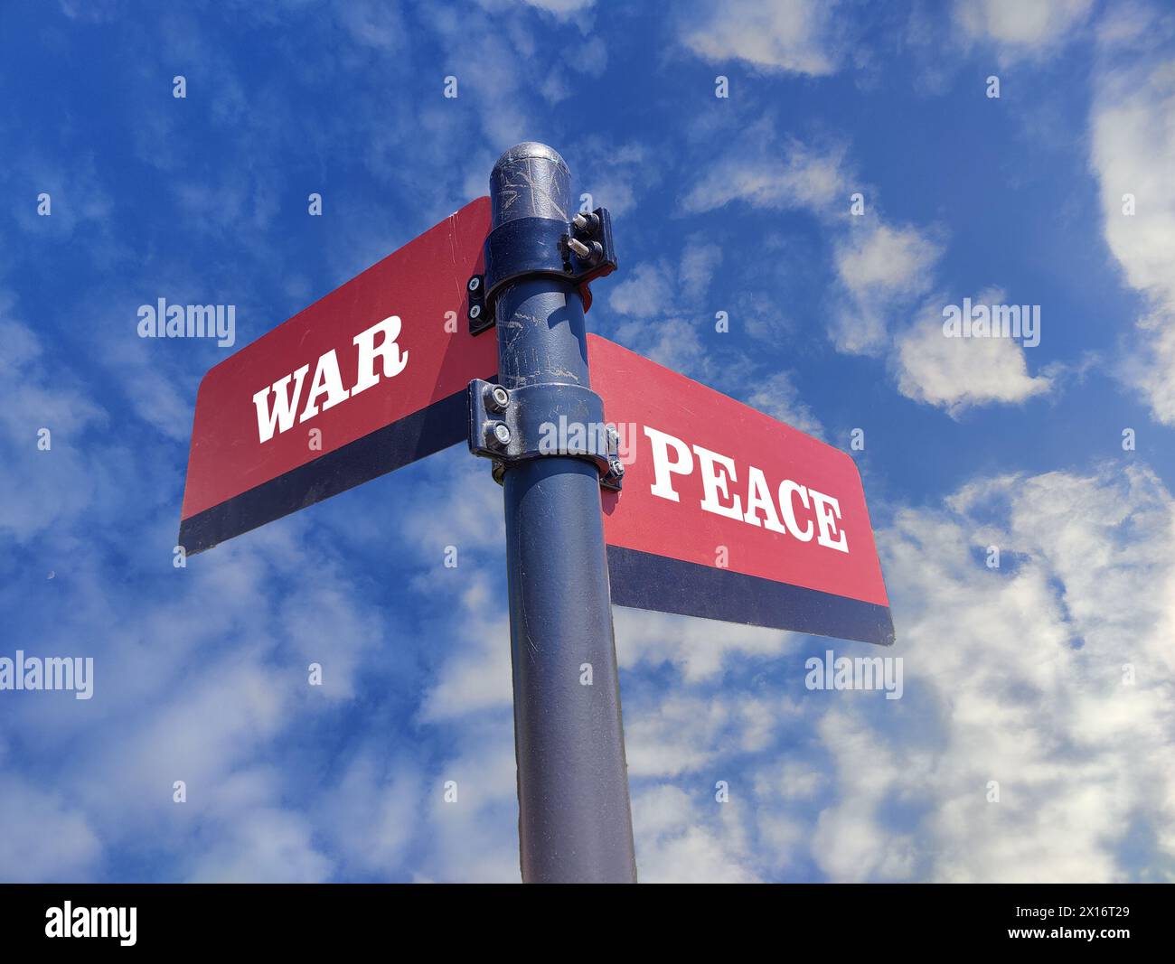 3d illustration, Red and black sign with the words peace and war written in white on the crossroads. Stock Photo