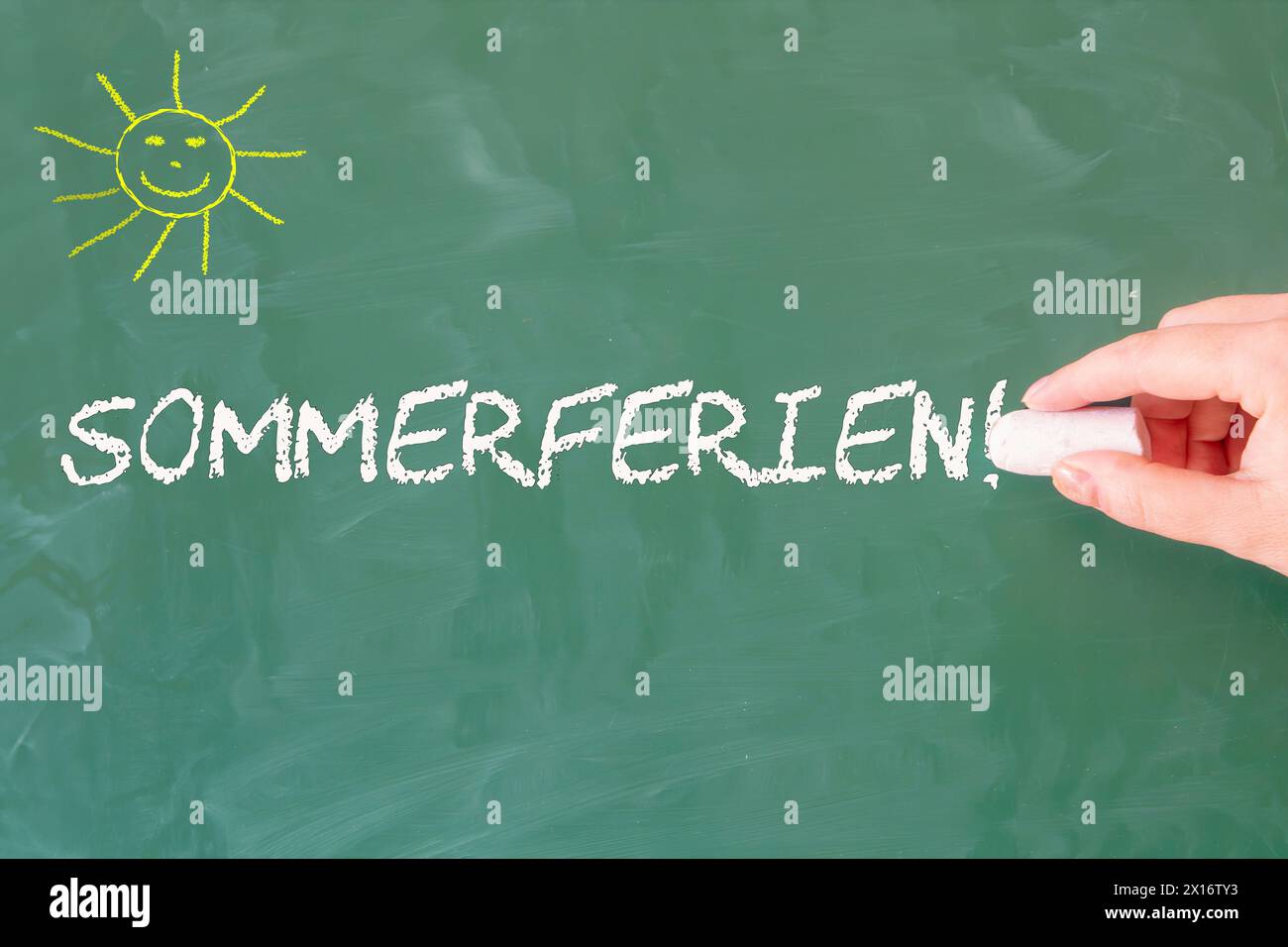 Symbol image of summer holidays (Germany): The word SOMMERFERIEN (summer holidays) is written on a school blackboard Stock Photo