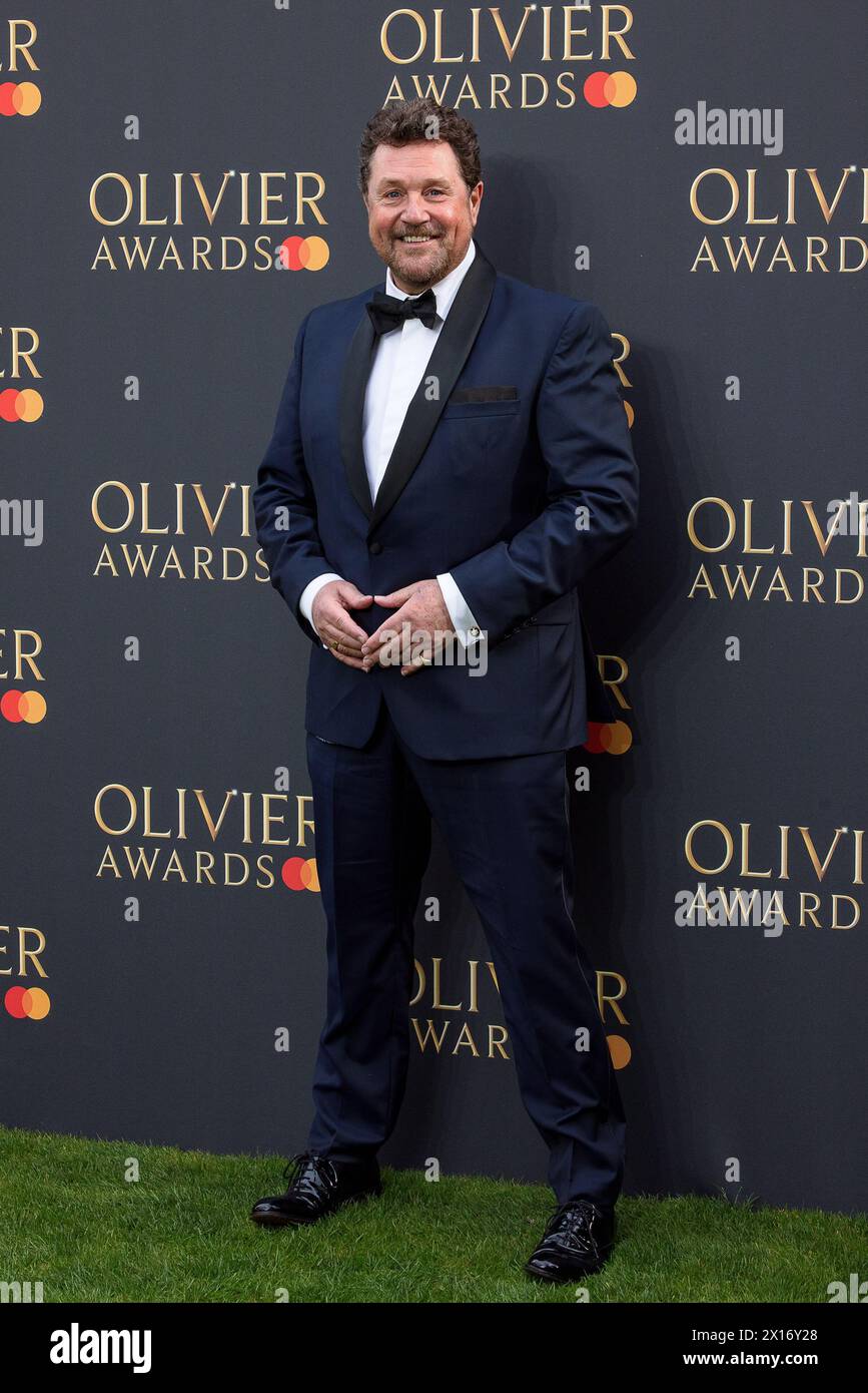 London, UK. 14th Apr, 2024. Michael Ball poses for Photographers on the Green Carpet at the 2024 Olivier Awards at the Royal Albert Hall Credit: David Betteridge/Alamy Live News Stock Photo