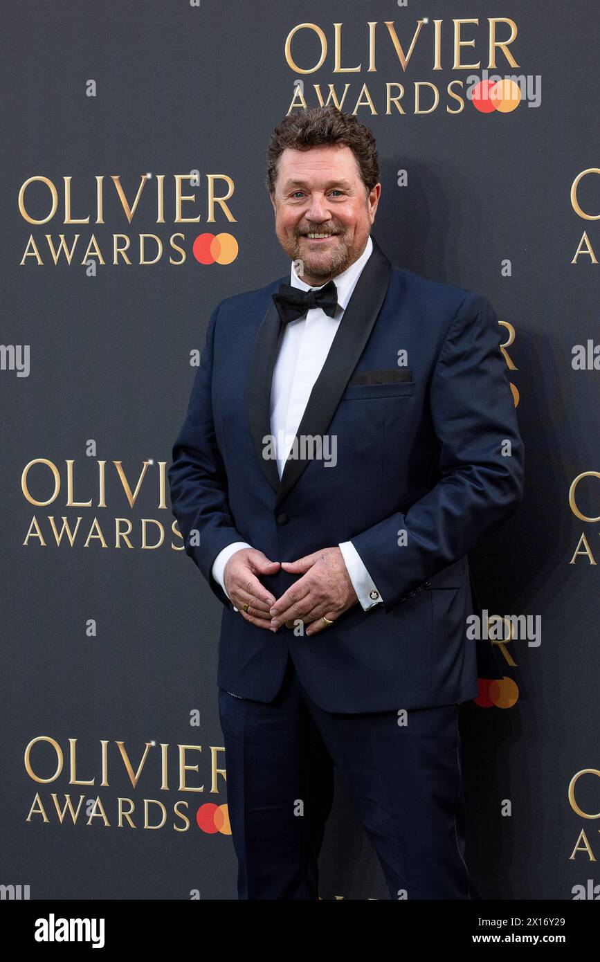 London, UK. 14th Apr, 2024. Michael Ball poses for Photographers on the Green Carpet at the 2024 Olivier Awards at the Royal Albert Hall Credit: David Betteridge/Alamy Live News Stock Photo