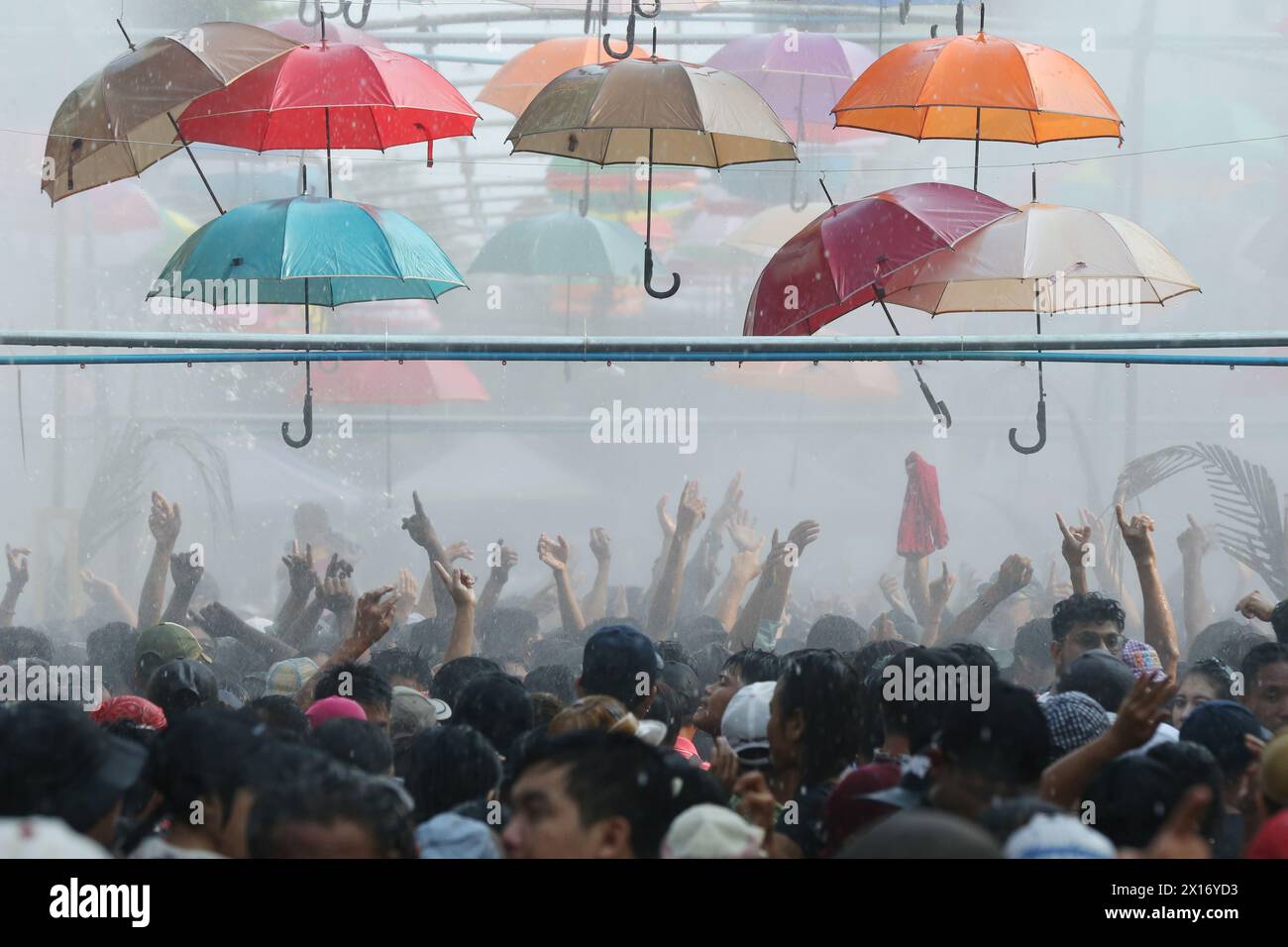 Yangon, Myanmar. 15th Apr, 2024. People celebrate the water festival in Yangon, Myanmar, April 15, 2024. Credit: Myo Kyaw Soe/Xinhua/Alamy Live News Stock Photo