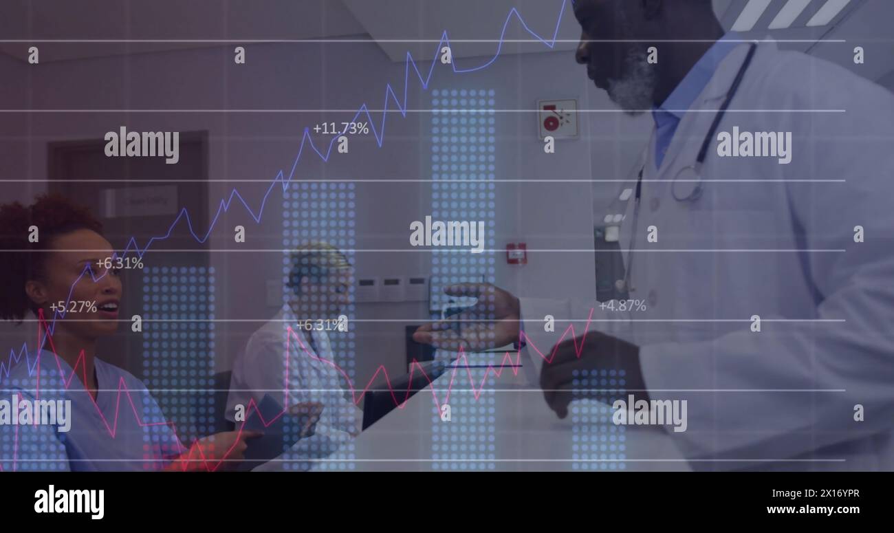 Image of graphs and changing numbers, diverse nurse handing patient file to male doctor Stock Photo
