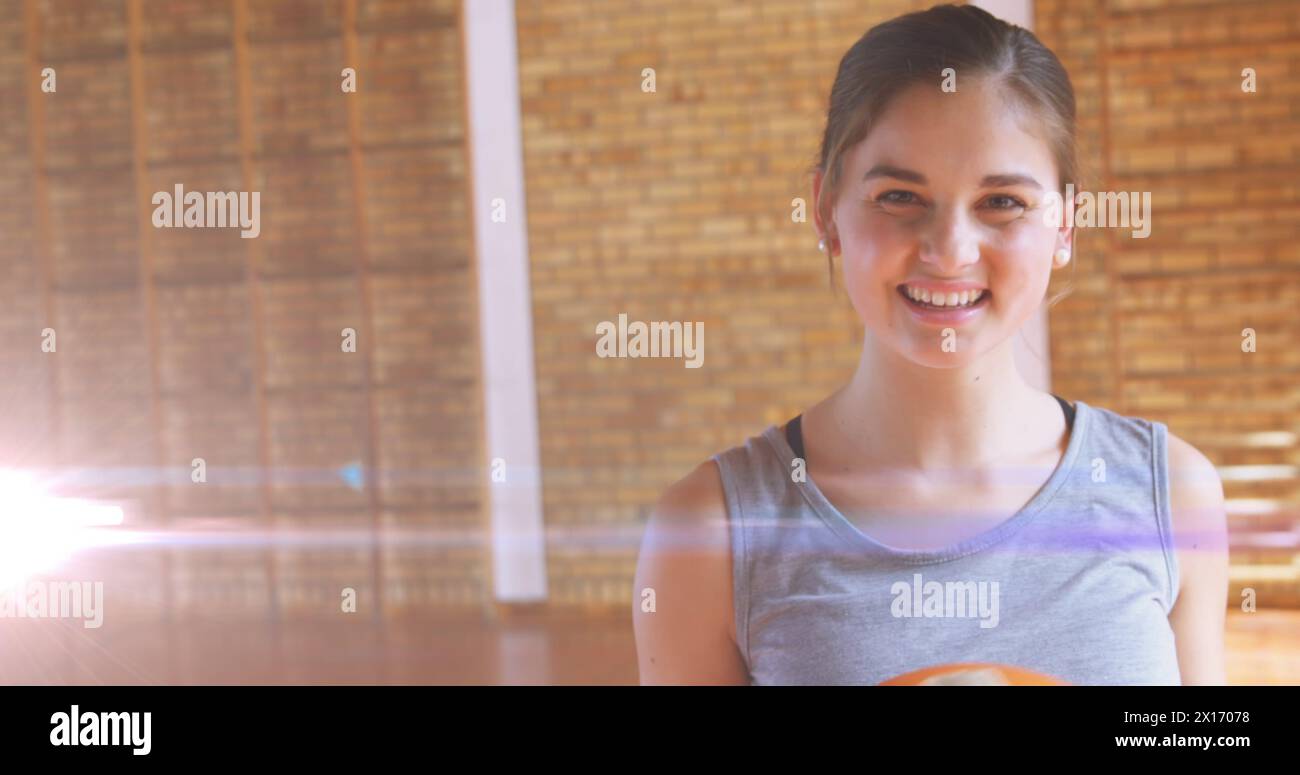 Image of happy caucasian girl holding basketball Stock Photo - Alamy