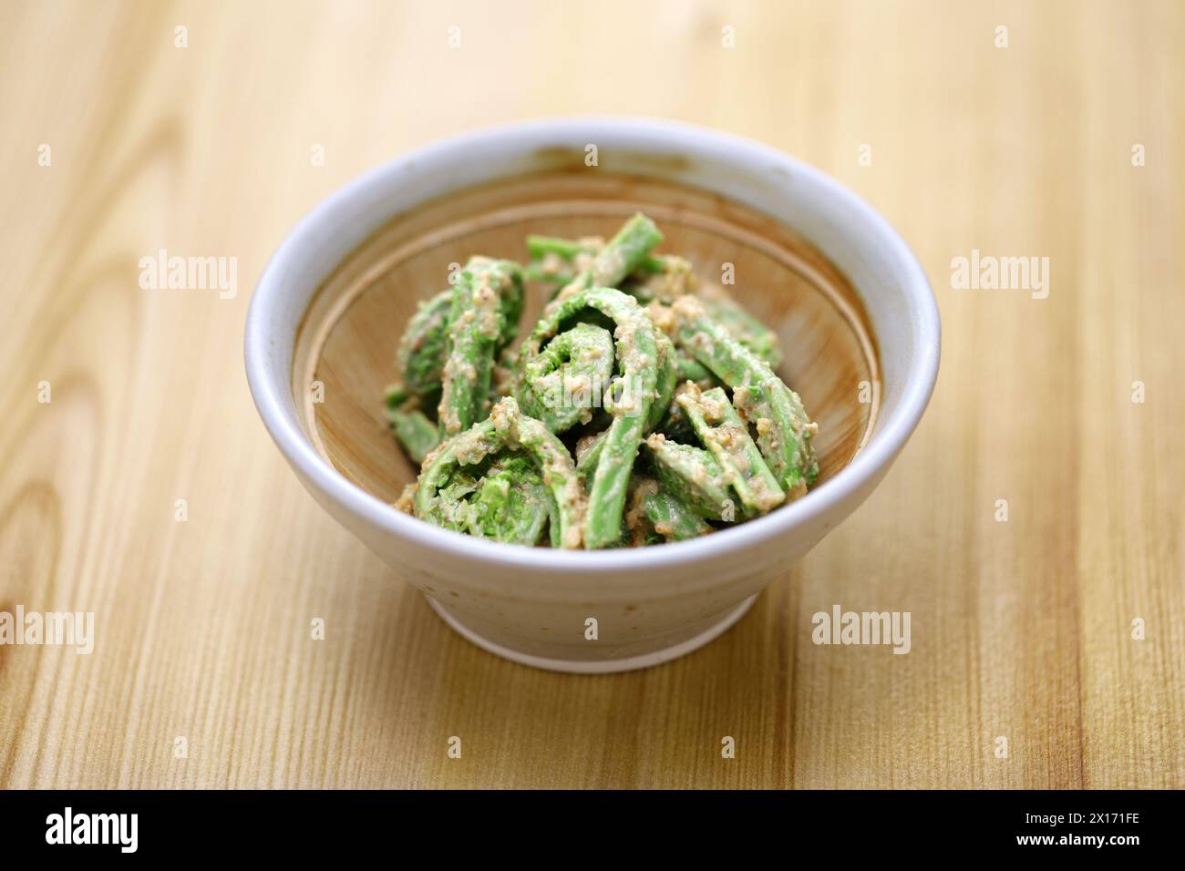 boiled fiddlehead (Ostrich fern) tossed with walnut dressing, Japanese cuisine Stock Photo