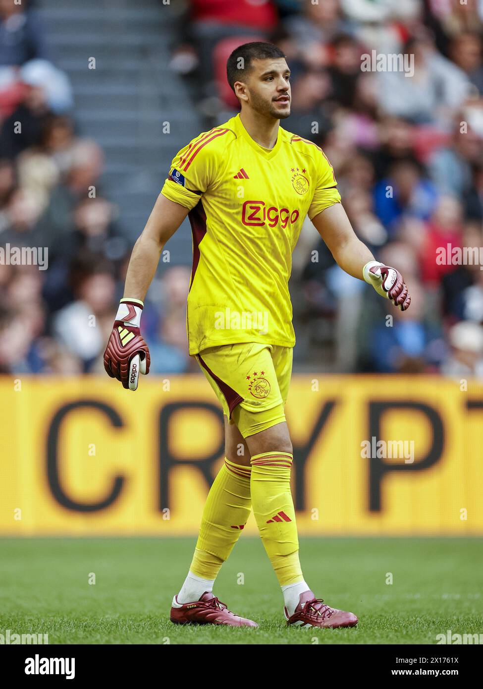 AMSTERDAM - Ajax goalkeeper Geronimo Rulli during the Dutch Eredivisie match between Ajax Amsterdam and FC Twente at the Johan Cruijff ArenA on April 14, 2024 in Amsterdam, Netherlands. ANP | Hollandse Hoogte | MAURICE VAN STEEN Stock Photo