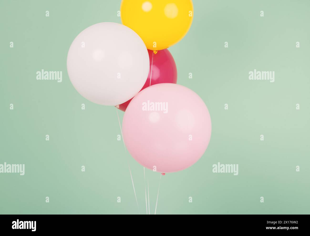 Mixed colour balloons hi-res stock photography and images - Alamy