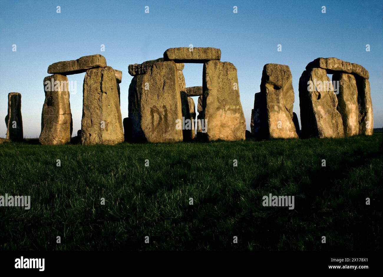 Stonehenge Wiltshire June 21st dawn sunrise. Graffiti DI on one of the prehistoric stones still visible but being treated by the National Trust. 1970s. UK HOMER SYKES Stock Photo