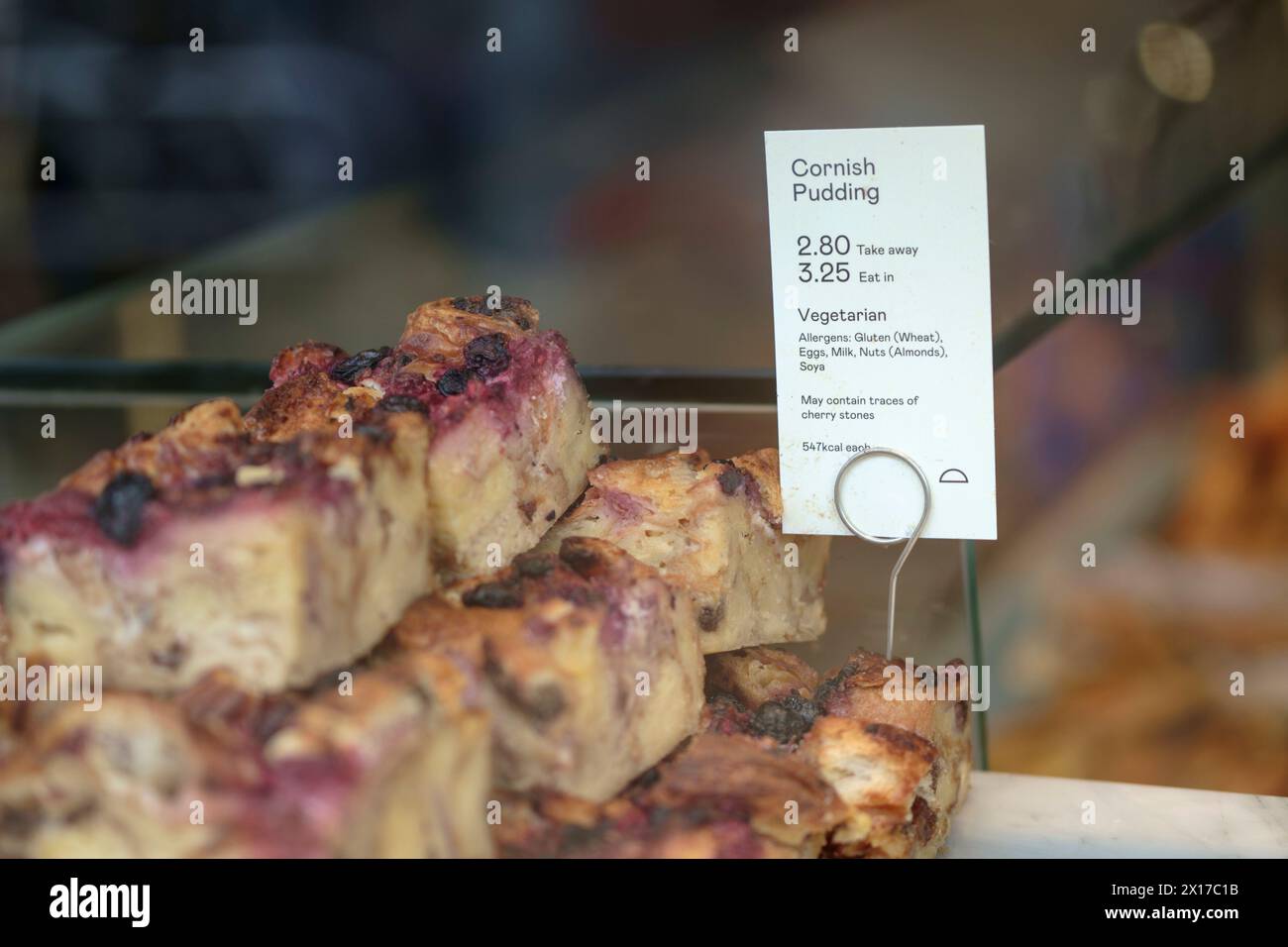 Cornish Pudding in the Window of Cornish Bakehouse Pasty shop cheltenham Glos UK Stock Photo