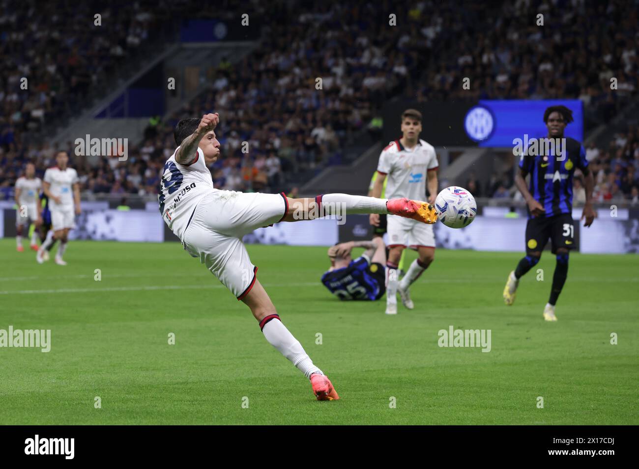 Milan, Italy. 14th Apr, 2024. Alessandro Di Pardo of Cagliari co-ordinates himself to shoot golawards during the Serie A match at Giuseppe Meazza, Milan. Picture credit should read: Jonathan Moscrop/Sportimage Credit: Sportimage Ltd/Alamy Live News Stock Photo