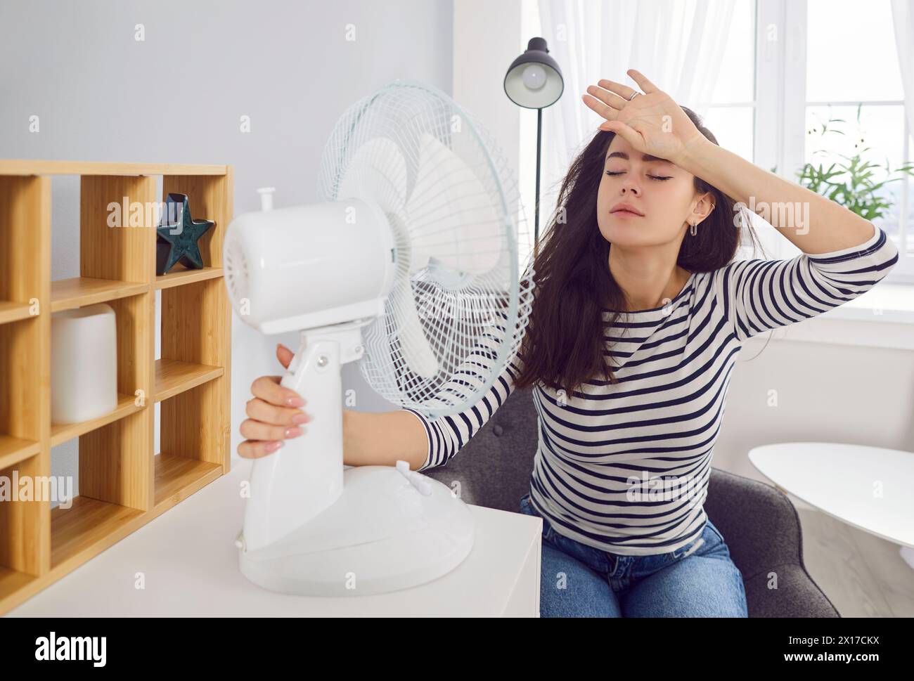 Electric fan heatwave home hi-res stock photography and images - Alamy
