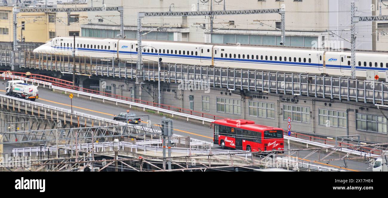 Shinkansen train leaving Kyoto station, Japan Stock Photo