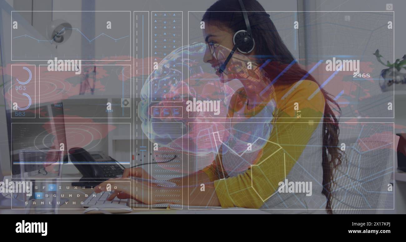 Image of data processing and brain over biracial businesswoman in office Stock Photo