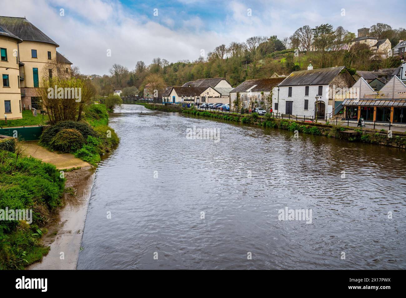 A view down the River Cleddau in the centre of Haverfordwest, Pembrokeshire, Wales on a spring day Stock Photo