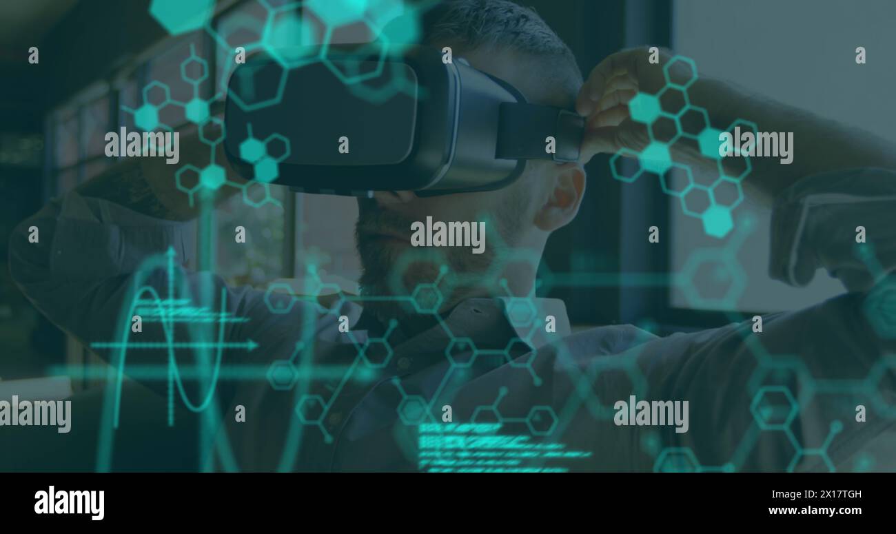 Image of chemical compounds and medical data processing over man wearing vr headset Stock Photo