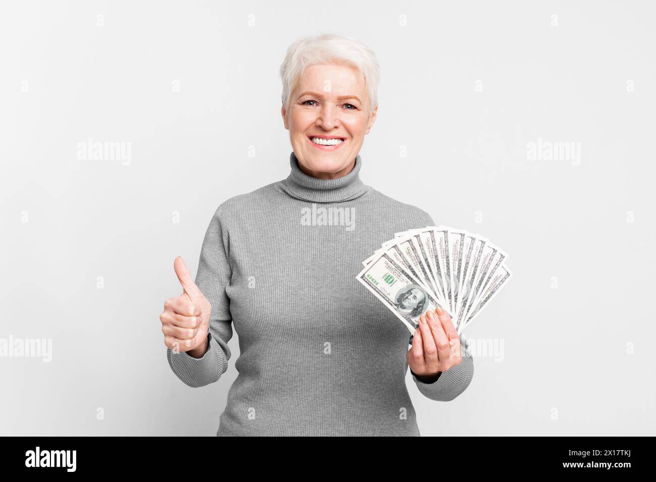 Thumbs up woman senior hi-res stock photography and images - Alamy