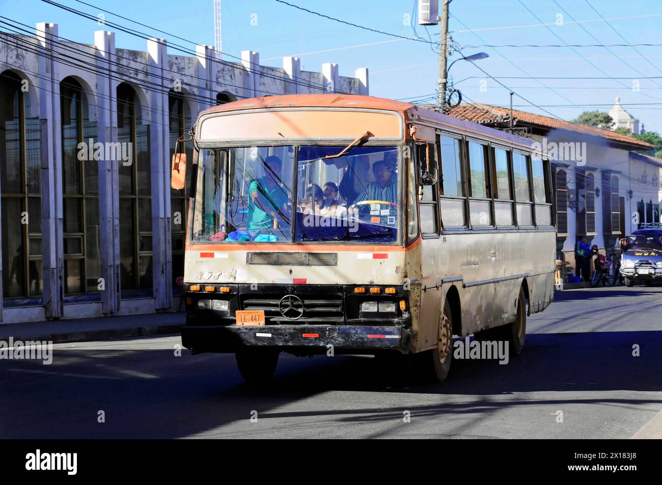 Leon Nicaragua, Old bus on a city street with visible buildings in the background, Nicaragua, Central America, Central America Stock Photo