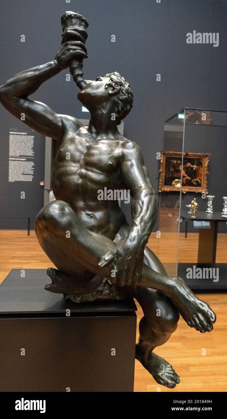 Bronze statue of a Triton blowing a conch shell in the Rijksmuseum, Amsterdam, Netherlands Stock Photo