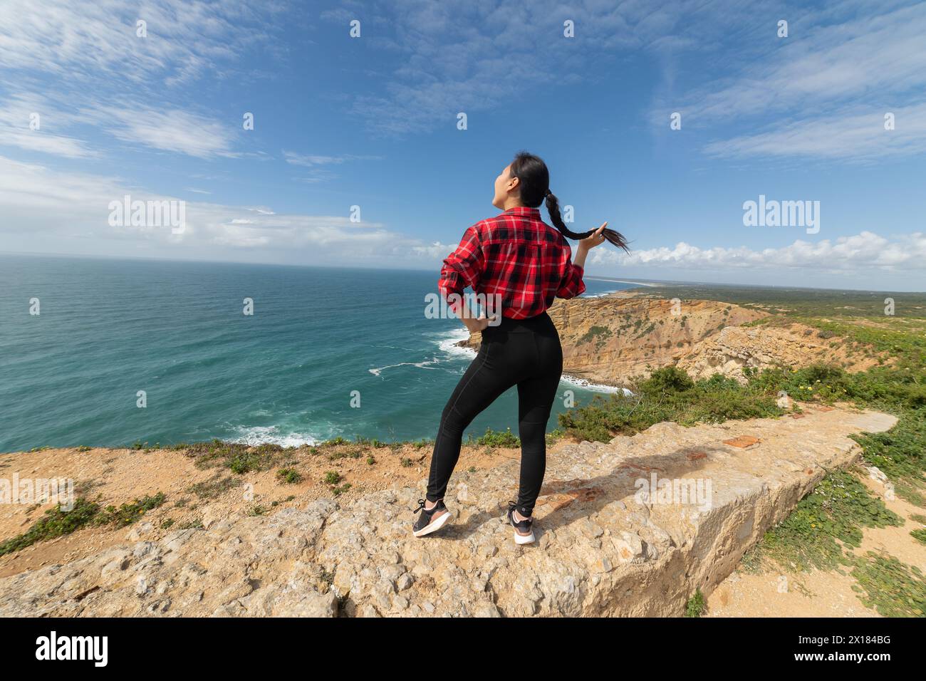 Backpacker stands on rocky hi-res stock photography and images - Alamy