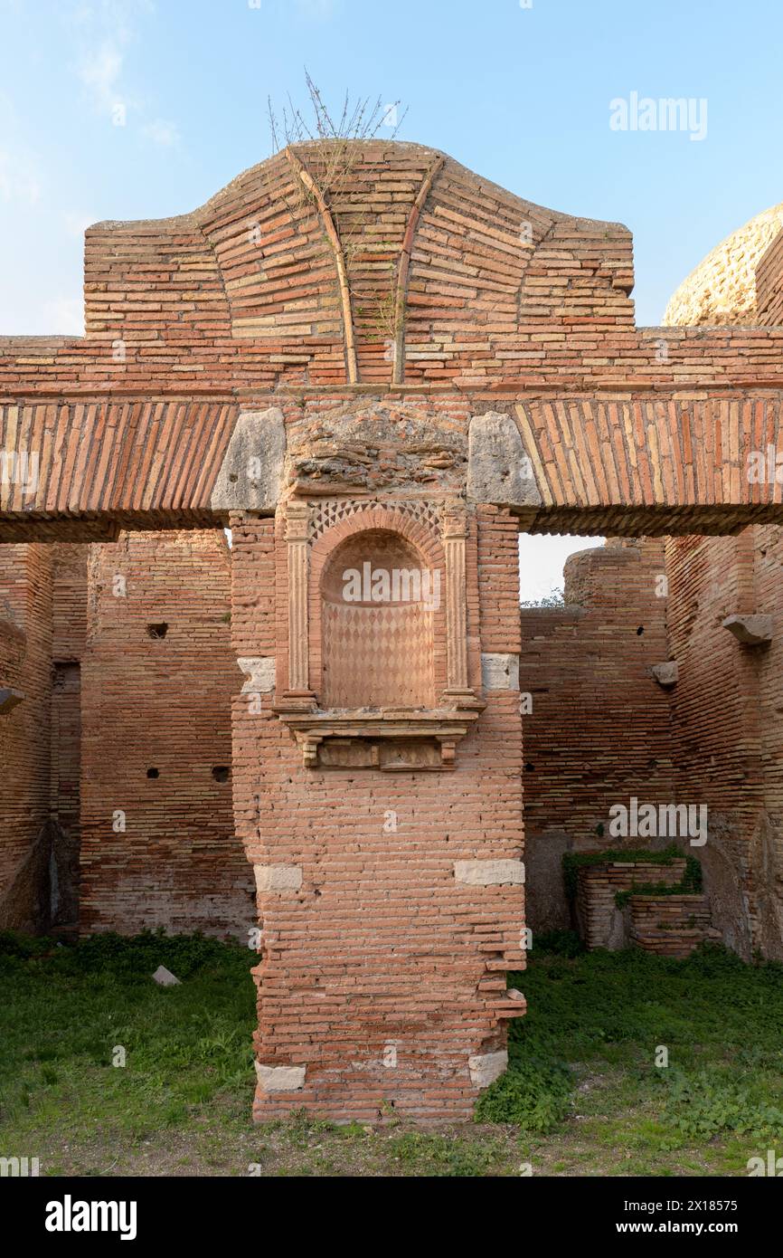 Detail of the niche of House of the Lararium in Ostia Antica. Ruins of ancient roman city and port. Rome, Latium, Italy Stock Photo