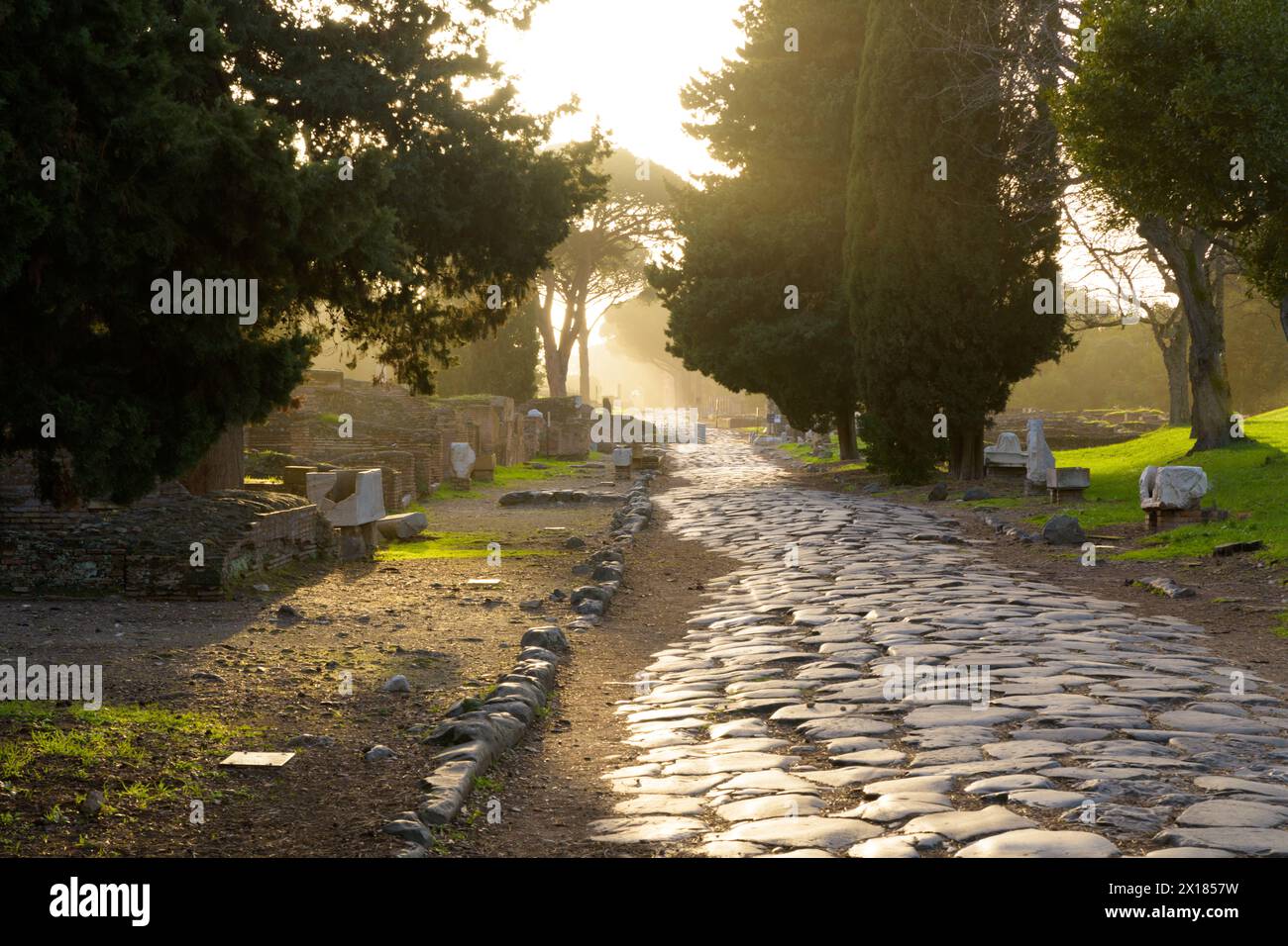 Ancient roman road in Ostia Antica. Rome, Latium, Italy Stock Photo - Alamy