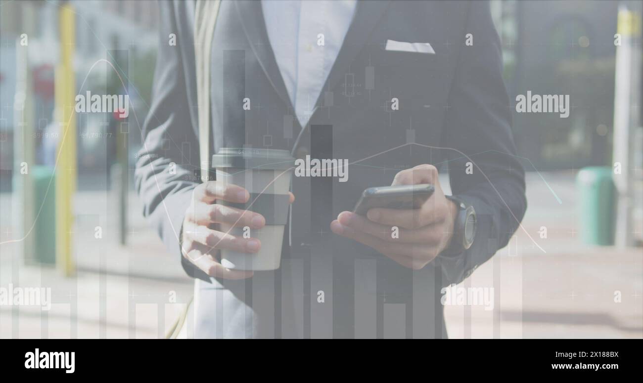 Image of financial graphs over midsection of caucasian businessman using smartphone Stock Photo