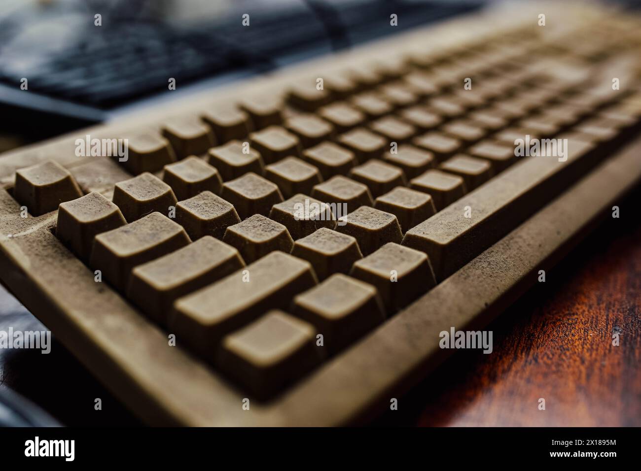 Old vintage computer mechanical keyboard in dust, computer keyboard from the 1980s Stock Photo