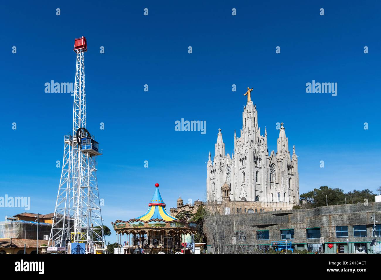 Parc d'atraccions Tibidabo amusement park and Expiatori del Sagrat Cor church in Barcelona, Spain Stock Photo