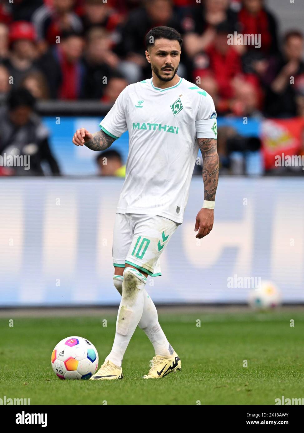 LEVERKUSEN - Leonardo Bittencourt of SV Werder Bremen during the Bundesliga match between Bayer 04 Leverkusen and Werder Bremen at the Bay Arena on April 14, 2024 in Leverkusen, Germany. ANP | Hollandse Hoogte | GERRIT VAN COLOGNE Stock Photo