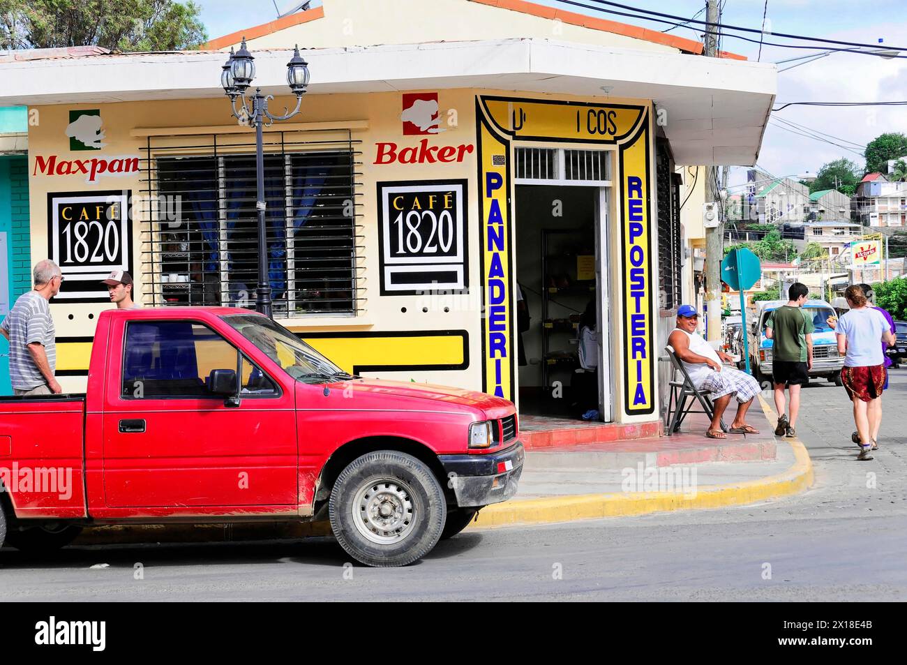 San Juan del Sur, Nicaragua, Bakery and cafe on a busy street corner with people walking by, Central America, Central America Stock Photo