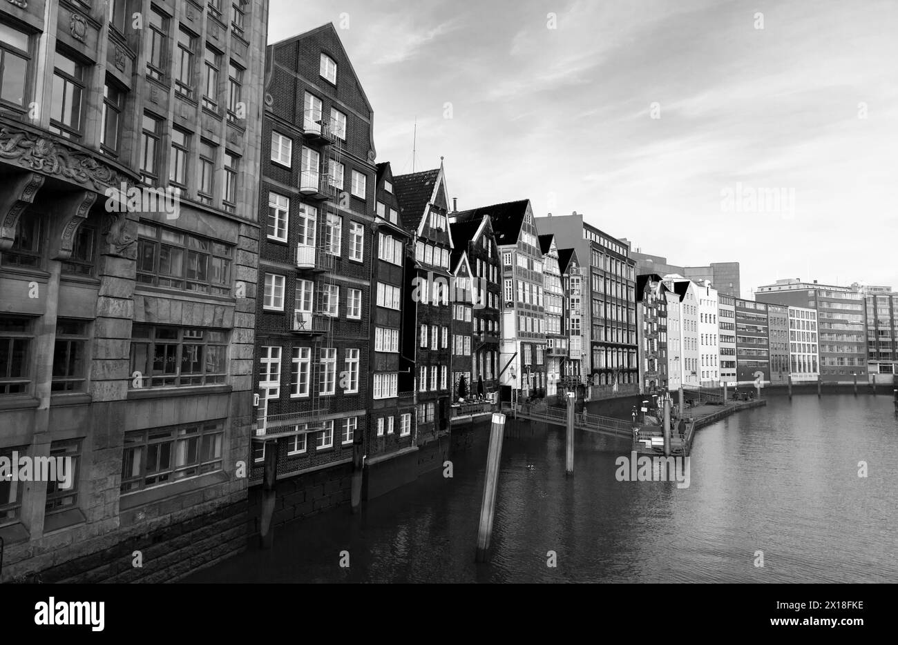 Hamburg, Germany - November 30, 2018: Old Hamburg town coastal view with facades of living houses of Altstadt district, black and white photo Stock Photo