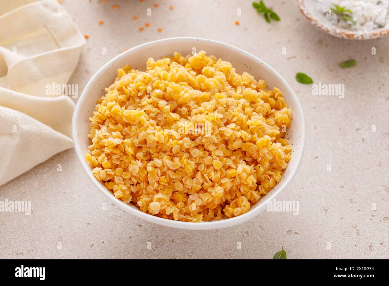 Cooked red lentils in a bowl, healthy vegan protein source, meat alternative Stock Photo