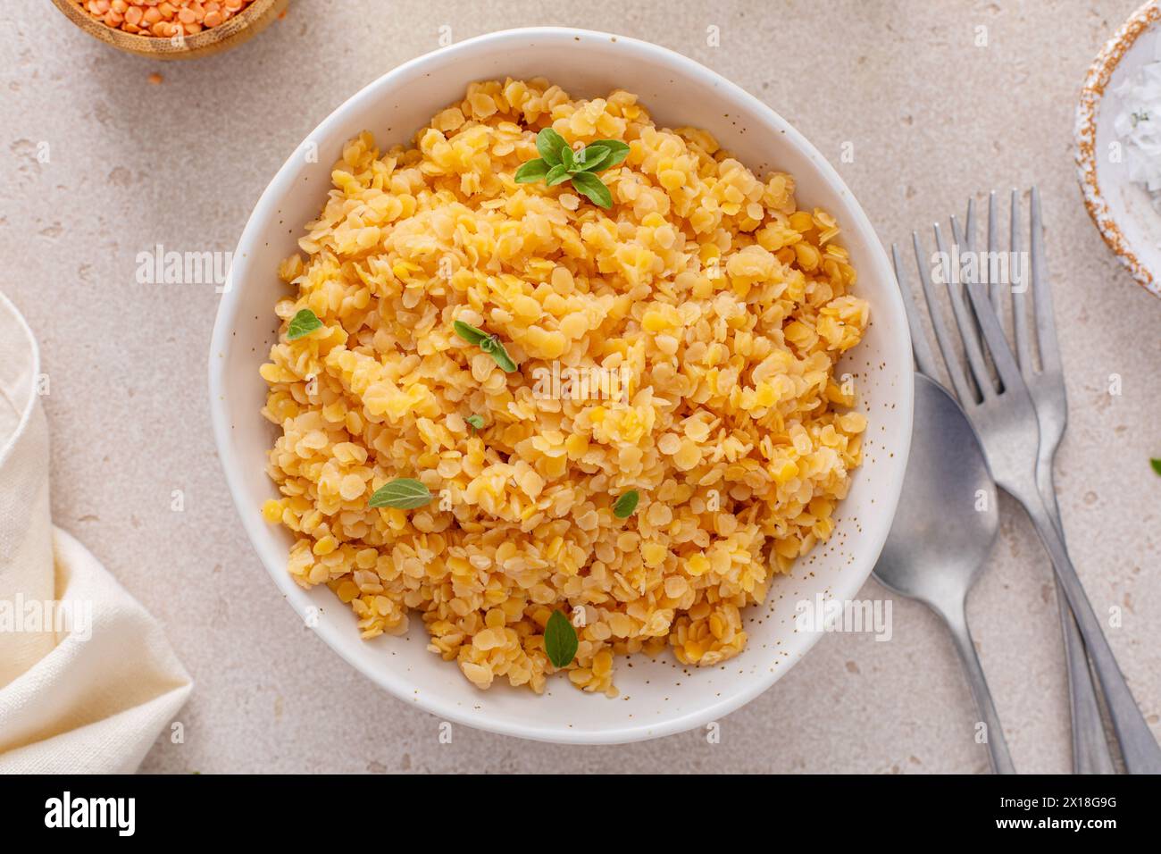 Cooked red lentils in a bowl, healthy vegan protein source, meat alternative Stock Photo